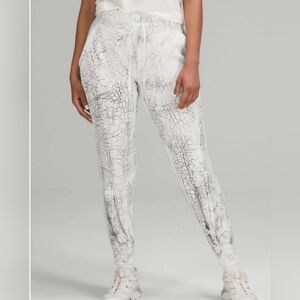 Lululemon Warm Down Joggers in the "Thread Dye White Black"